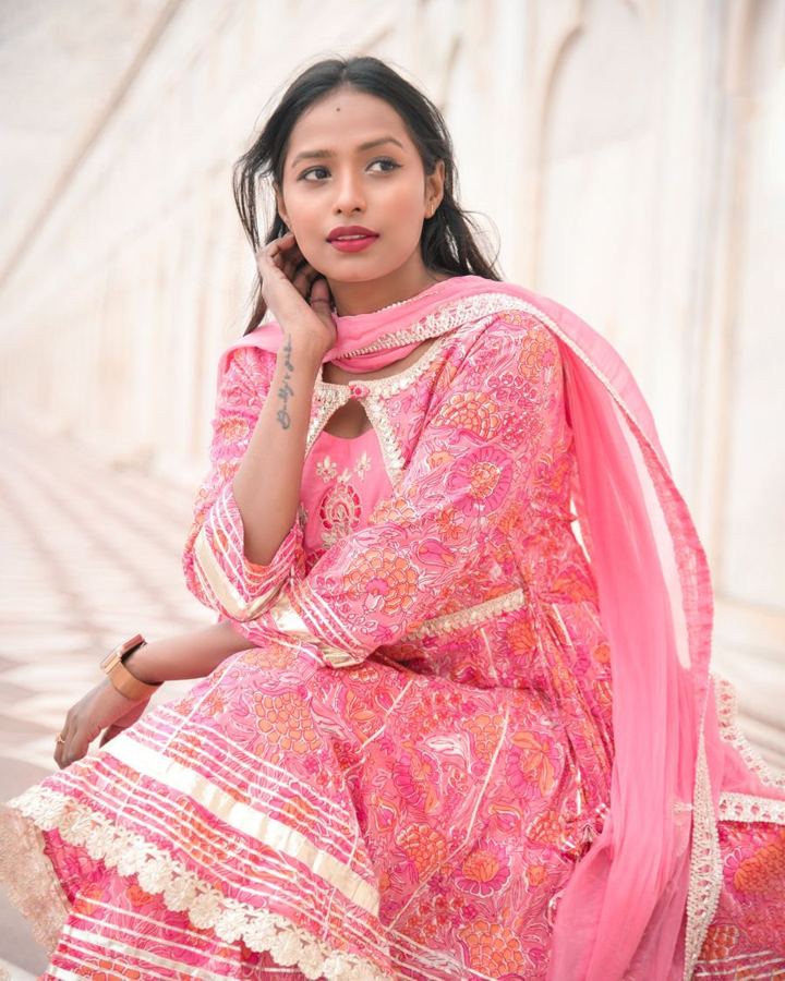 Woman in a pink gota kurta set